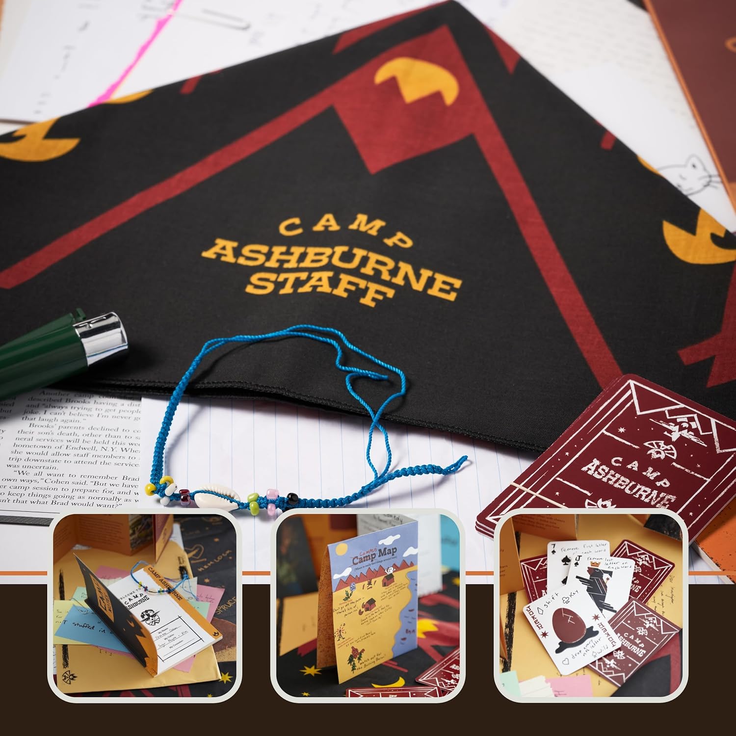 A spread of Hunt A Killer: Camp Calamity game components including a black Camp Ashburne Staff folder with geometric camp logo, a beaded friendship bracelet, camp-branded playing cards, a camp map booklet, letters, handwritten journal pages, and other evidence items spread across a wood-grain surface.